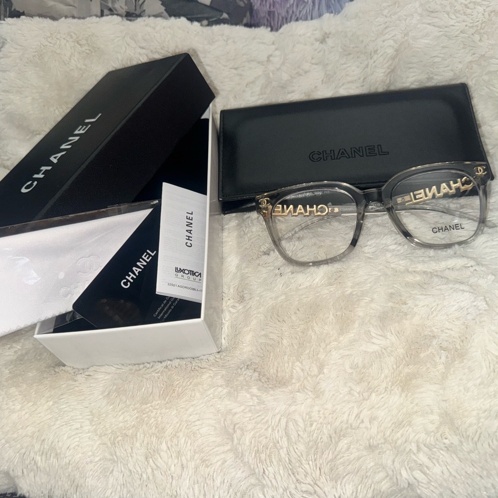 Similar to CHANEL Gray Transparent & Gold Logo Eyeglasses